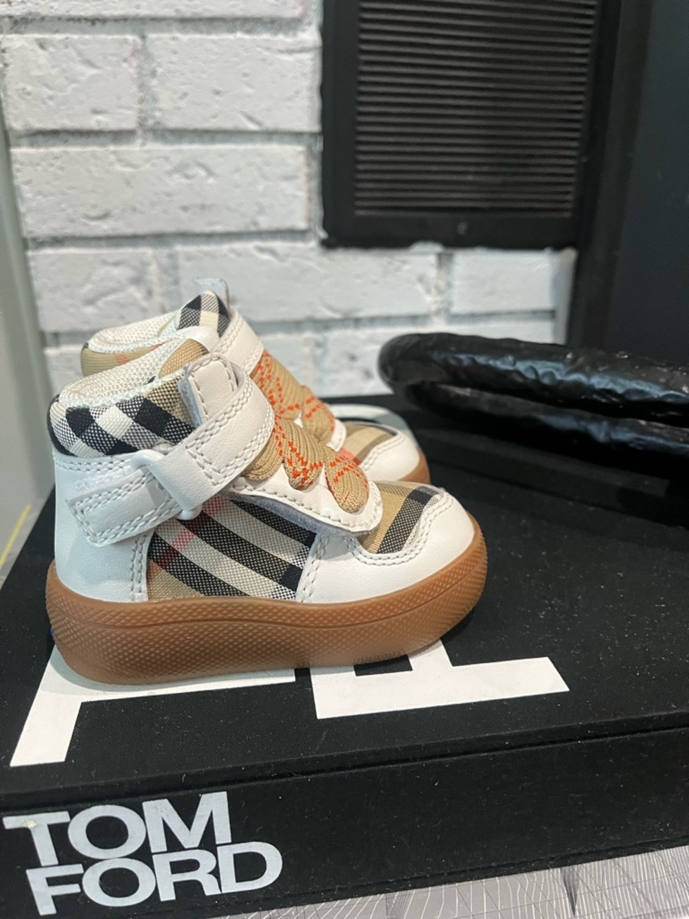Baby Burberry Sheldon High Top Sneaker size 19 runs like a size 18 in my opinion